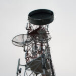 Telecommunication tower blue sky background,Phone antenna