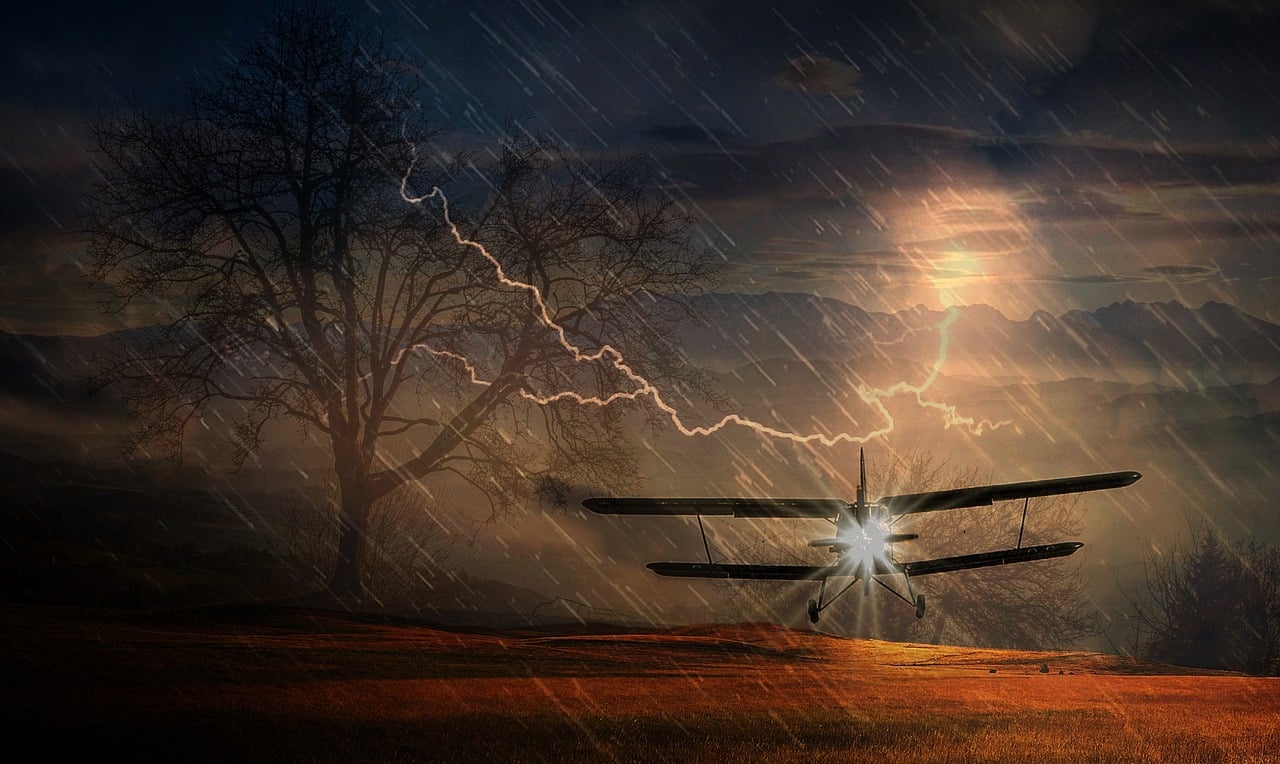 plane flying through rain